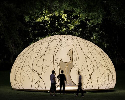 translucent illuminating dome bears bronze lattice of flower motifs in shanghai