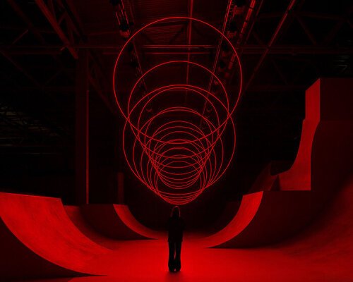 floating rings of light redraw space in SpY’s kinetic spatial installation